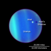 Der Mond Ariel wirft einen Schatten auf Uranus